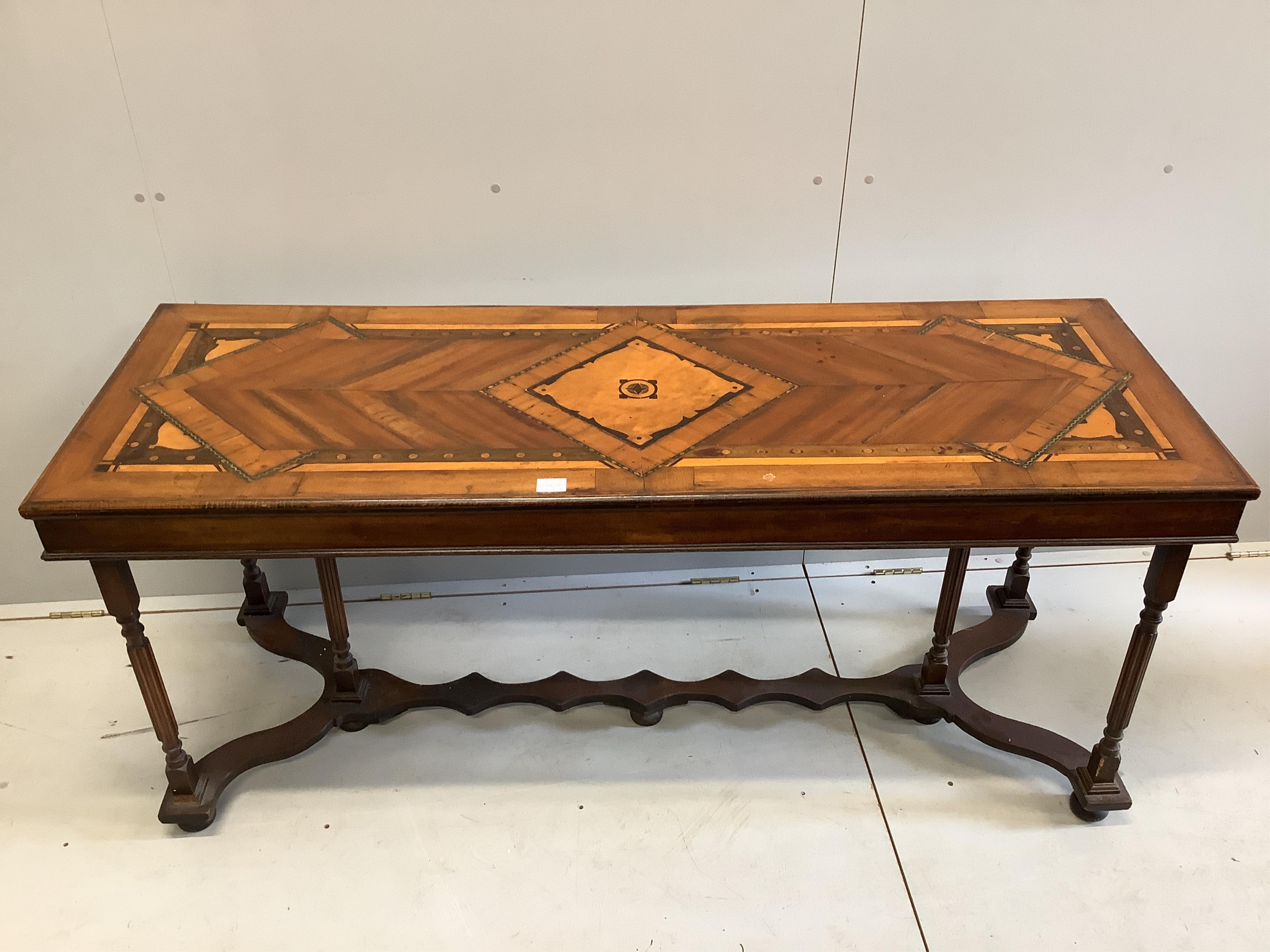 A rectangular parquetry inlaid serving table, width 166cm, depth 60cm, height 73cm. Condition - fair